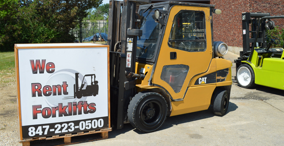 A forklift rental holding a forklift rental sign.